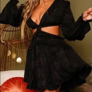 Never worn size large great condition black mini cutout dress